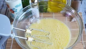 In a deep bowl, beat all the eggs, add sugar and beat well.