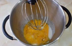 To prepare the biscuit, mix the eggs with sugar and start whipping, gradually increasing the power of the blender to the maximum. Beat un...