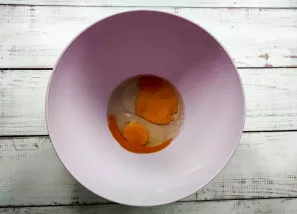 Place the eggs in a deep dish.