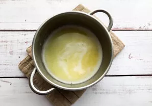 Melt the butter over low heat.