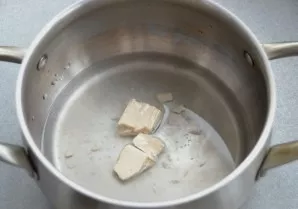 Dissolve the yeast in warm water.