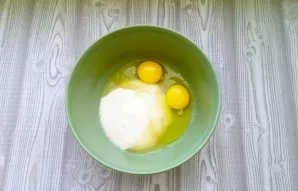 Pour sugar into a bowl and beat the eggs. Beat with a whisk or mixer.