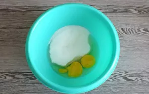 Mix eggs and sugar in a bowl. Beat with a mixer until fluffy, white.