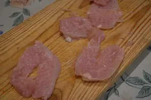 Beat each slice with a meat hammer.