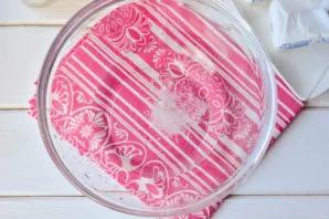 Pour water into a bowl and add salt.