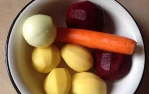 Peel and wash all the vegetables.