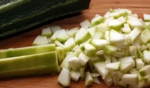 Chop zucchini.