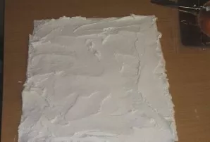 Apply soft cottage cheese.