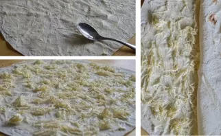 Take one lavash, grease it with mayonnaise, using half the total amount specified in the recipe. Now put melted cheese on top of the mayo...