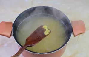 Put the pasta in boiling water and cook until tender. Usually it takes 7-10 minutes. Pasta should become soft.