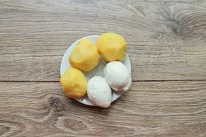 Boil the potatoes and eggs until tender, cool and peel.