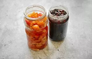 Wash and dry the dried fruits. Cut large ones into pieces. Put light and dark dried fruits in different jars and pour syrup, close tightl...