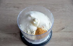 Add flour, salt, sugar, vanilla sugar, lemon peel to the mixer bowl.