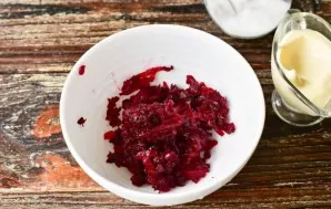 Grate boiled or baked beets.
