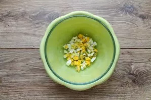 Peel the egg and cut into cubes, put in a bowl.