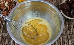 Add sunflower oil and continue beating.