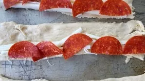 Put sausage on top. To make it easier, you can cut the slices in half.