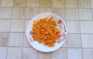 Wash the carrots, peel them and boil them. Cool and cut into small cubes.