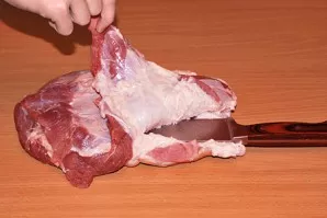 So, how do you season a bacon roll well? Use a sharp knife to cut lengthwise to unwrap the piece.