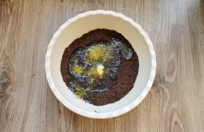 Crush the biscuits in any convenient way into fine crumbs. Set aside 100 grams of crumbs, pour in the butter cooled down in the remaining...