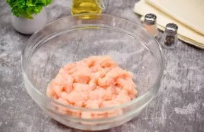 Wash and dry the chicken fillet. Then cut the fillet into small cubes and put in a deep bowl.