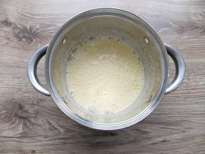 Break two eggs into a bowl and add 75 grams of sugar. Beat everything until a fluffy light mass. It will take approximately 6-8 minutes.