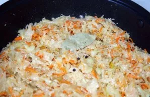 Add cabbage, bay leaf, pepper, sugar, cumin and salt. Cook for five minutes. and then add water so that it covers the cabbage a little. L...