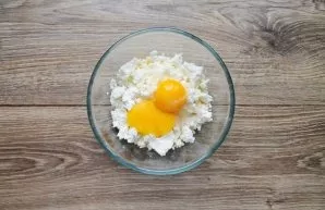 Separate the eggs into whites and yolks, take out the whites for now, you will need them later. Put the cottage cheese in a bowl and beat...