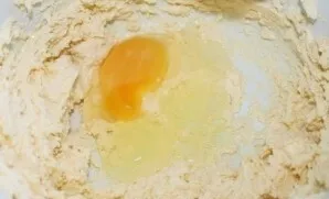 Add the eggs one at a time and mix well until smooth.