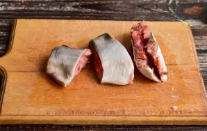 Cut the fish into portions.