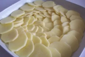 Place in a baking dish (if not ceramic, grease with a tablespoon of vegetable oil). Add salt.