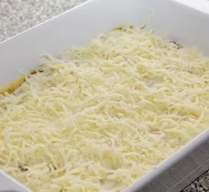 Sprinkle with grated cheese.