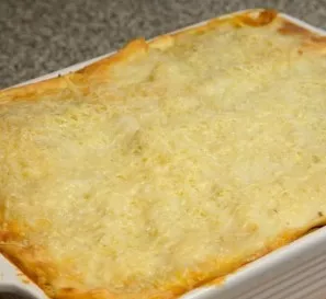 Take the lasagna out of the oven, sprinkle it with grated parmesan and put it in the oven for another 10 minutes. We take the prepared la...