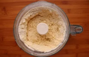 Then slowly pour ice water. You may need a little less or a little more water, so add no more than a tablespoon at a time.