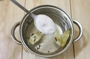 Add salt to the pot.