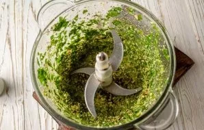 In a blender (chopper) bowl, add the prepared basil, walnut and garlic. Crush until smooth, add salt to taste, pour olive oil, water and ...