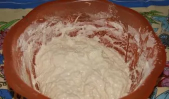 Stir the dough. It should be a little thicker than sour cream.