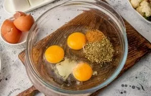 Break the eggs into the right bowl, add salt and black pepper to taste. For taste add dried oregano. If you dont like oregano, do not put...