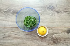 Squeeze lemon juice on parsley leaves. Make sure that seeds do not get there.