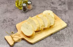 Cut the baguette into small pieces.