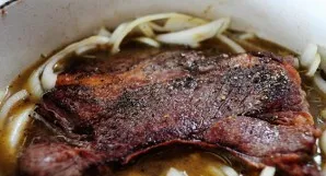 Place the beef in the pan, press down to dip in the liquid. Cover and bake in the oven for 1/2 to 3 hours until the meat is tender.