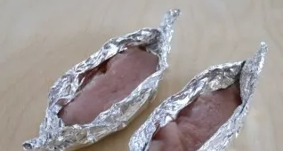 Wrap the meat in foil in the form of a boat.