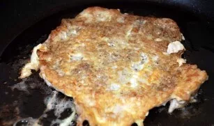 Heat vegetable oil in a pan, soak the meat in an egg and put in a pan. Cook over medium heat for about 3-4 minutes on each side. Put the ...