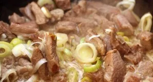 Fry the meat over high heat until a golden brown crust forms. Put the meat in small portions so as not to pre-isolate the juice. Cut the ...