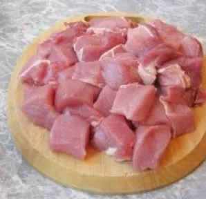Cut the pork into cubes.