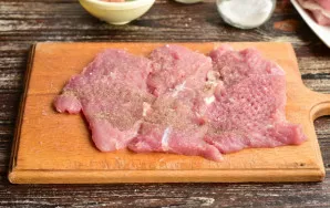 Season with salt and pepper.