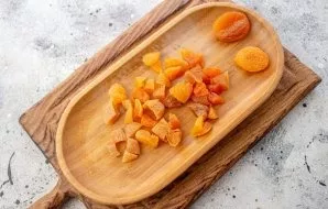 Then cut the dried apricots into small pieces.
