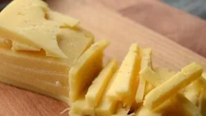 Cut the cheese into strips.