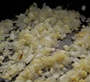 Finely chop the onion and garlic. Heat a little olive oil in a pan, add the onion and garlic and cook over medium heat, stirring occasion...