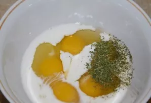 Separately mix eggs and milk. Add salt and spices.